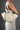 Archive Doppio with Pouch in Almond Beige carried over the shoulder
