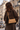 Lia in Desert Tan worn with brown tailoring