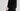 Louv Heart in Spicy Red worn with a black outfit