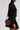 Louv Heart in Spicy Red worn with a black outfit